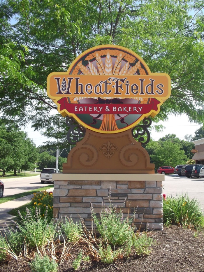 Illuminated, double-face Wheatfields monument sign at One Pacific Place