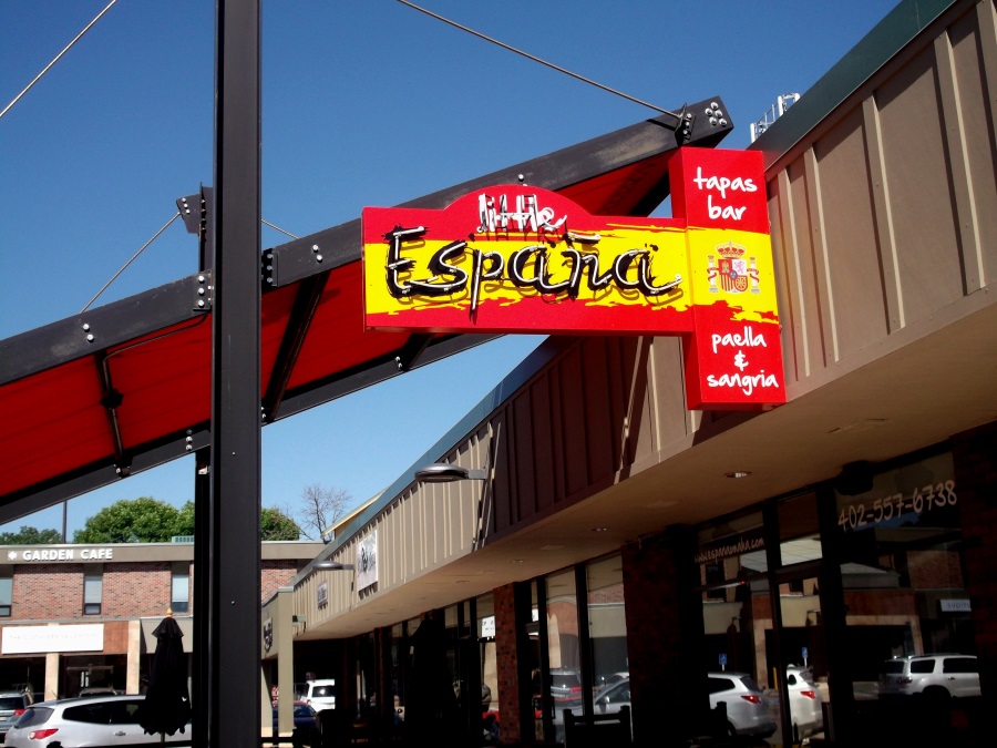 Neon illuminated, double-face projecting sign for Little Espana in Rockbrook Village